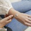 Joma A Little February Birth Flower Bracelet Joma A Little February Birth Flower Bracelet